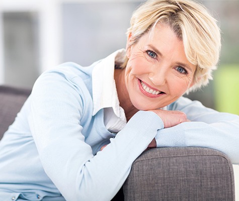 Woman smiling after dental restoration