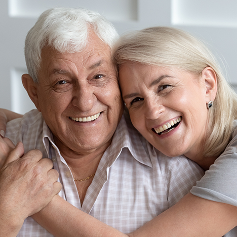 Senior man and woman smiling