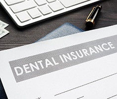 Dental insurance paperwork to help pay for dental implants