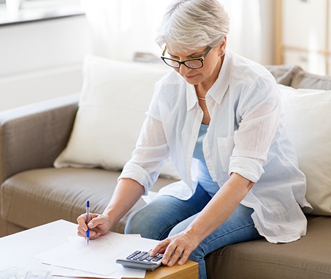 Woman completing dental insurance forms