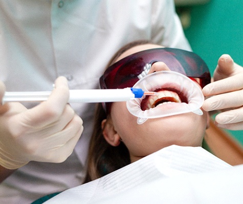Patient receiving KöR teeth whitening in Lancaster