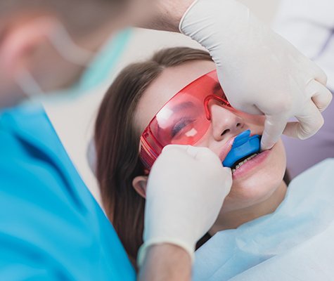 Patient receiving fluoride treatment