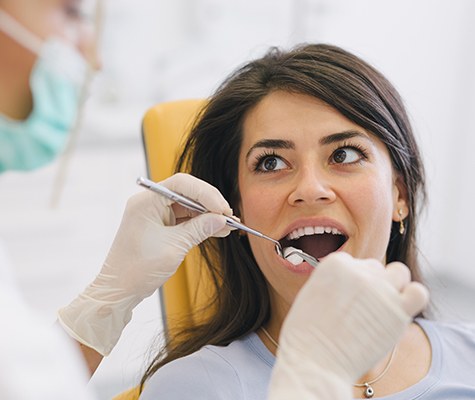 Woman receiving root canal therapy