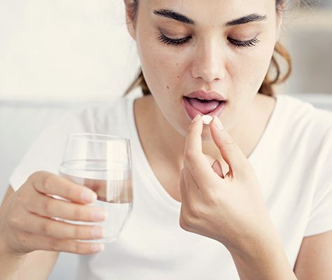 Patient taking oral conscious dental sedation pill