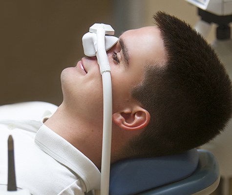 Patient with nitrous oxide dental sedation mask