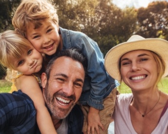 Smiling family after preventive dentistry