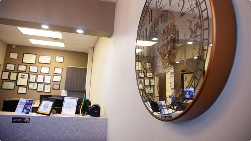 Clock on wall and front desk