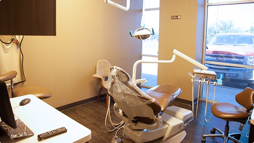 Back view of dental chair facing out a window