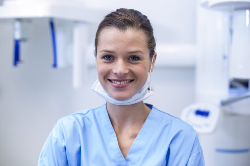 A dental hygienist in a dentist's office